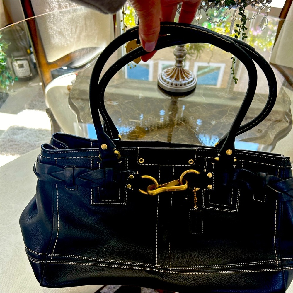 Authentic Coach handbag. Beautiful details with gold hardware.